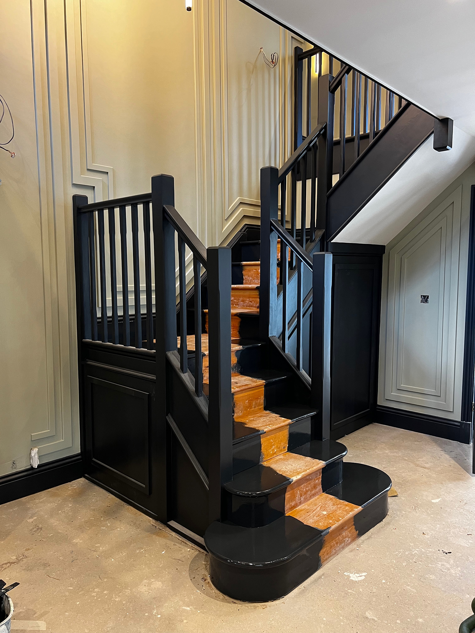 photo of black painted stairway of domestic home